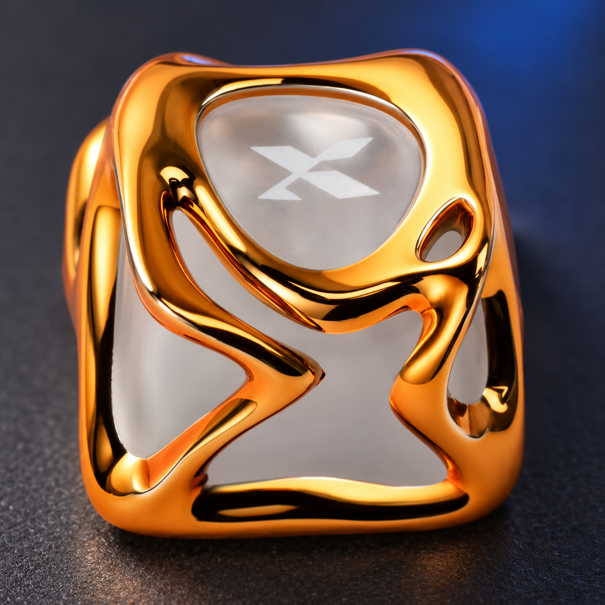 Molten Gold XVX keycap: close-up of the flowing sculpted edges and gold-colour surface.