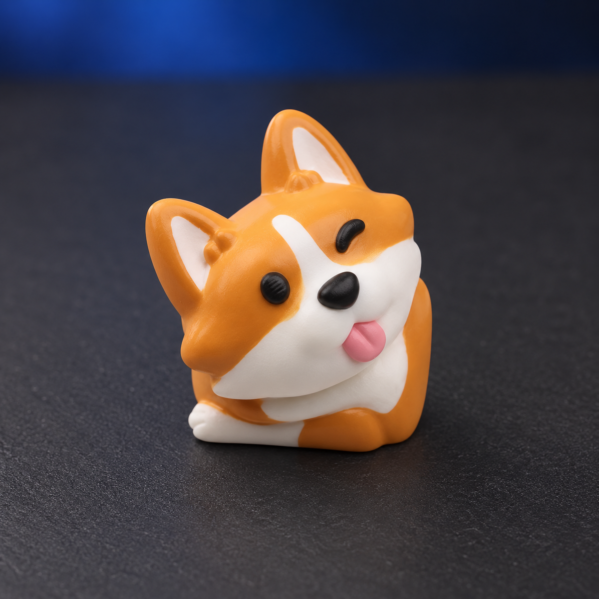 Corgi Charm viewed from above, showing the sculpted ears, face and white resin details.
