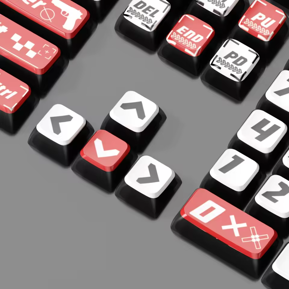 Close-up supplier illustration of Signal Red arrow and navigation keycaps, showing red and white legends and black sides.