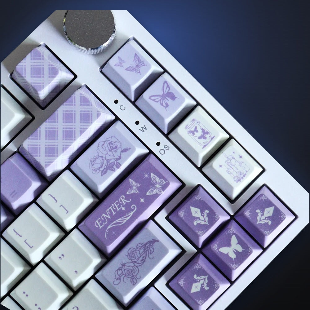 Close-up of Lilac Wings butterfly and Enter keys. Keyboard not included.