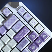 Close-up of Lilac Wings butterfly and Enter keys. Keyboard not included.