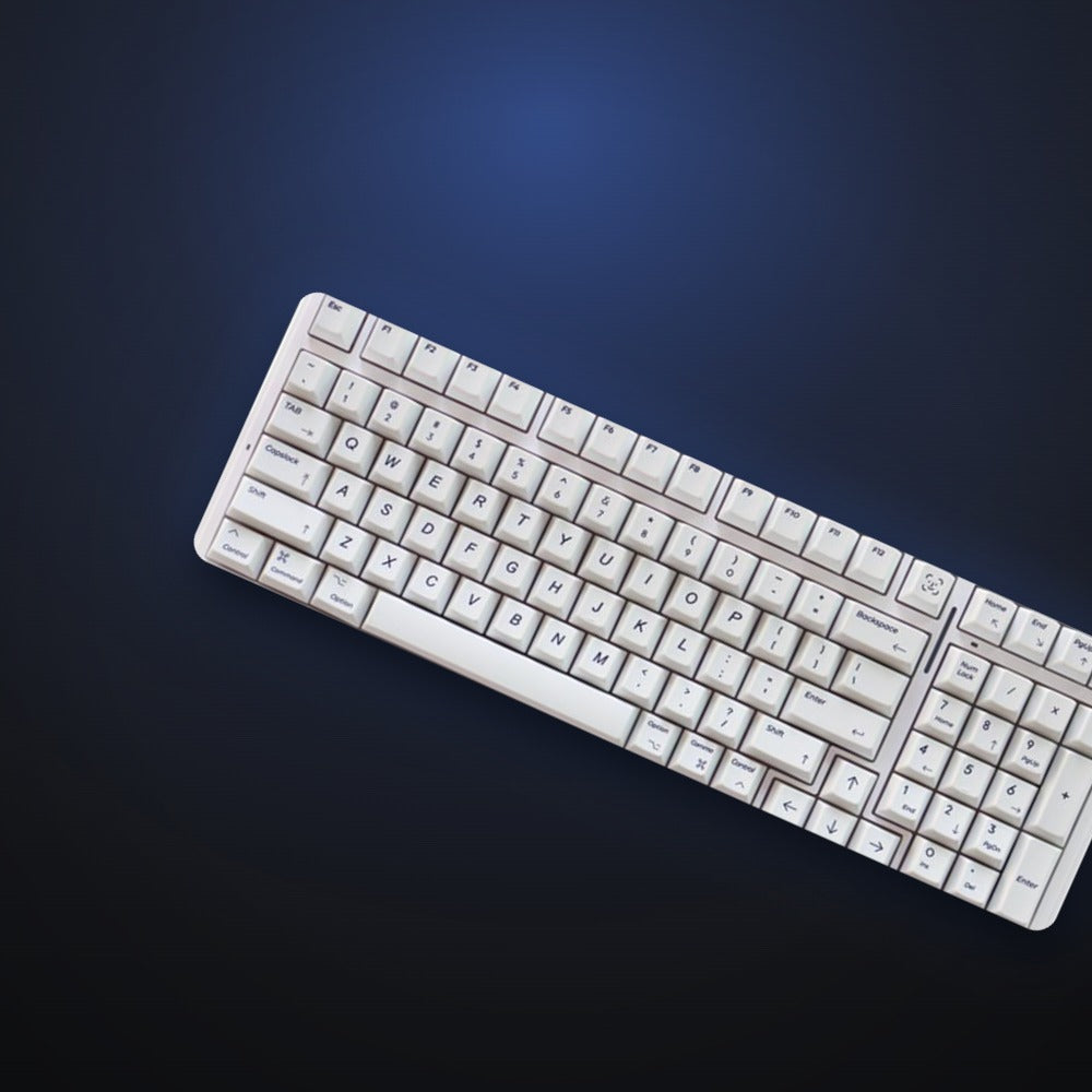 Pure White keycaps with black legends, angled view. Keyboard not included.